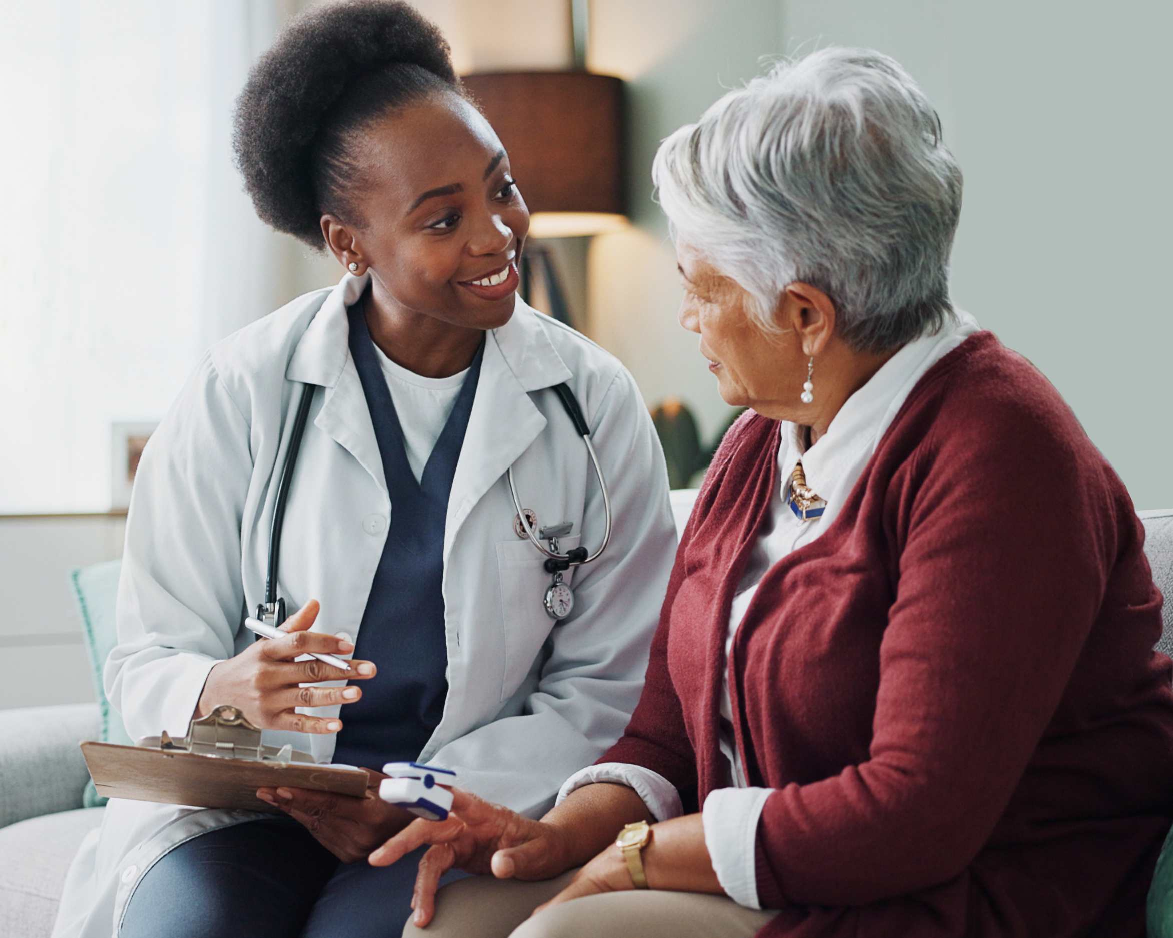 Physician having a discussion with patient