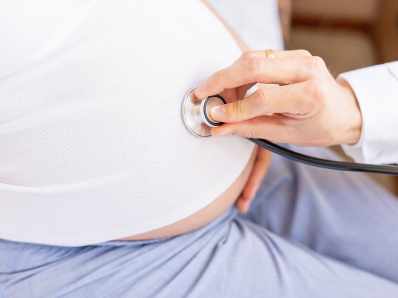 Examining pregnant woman