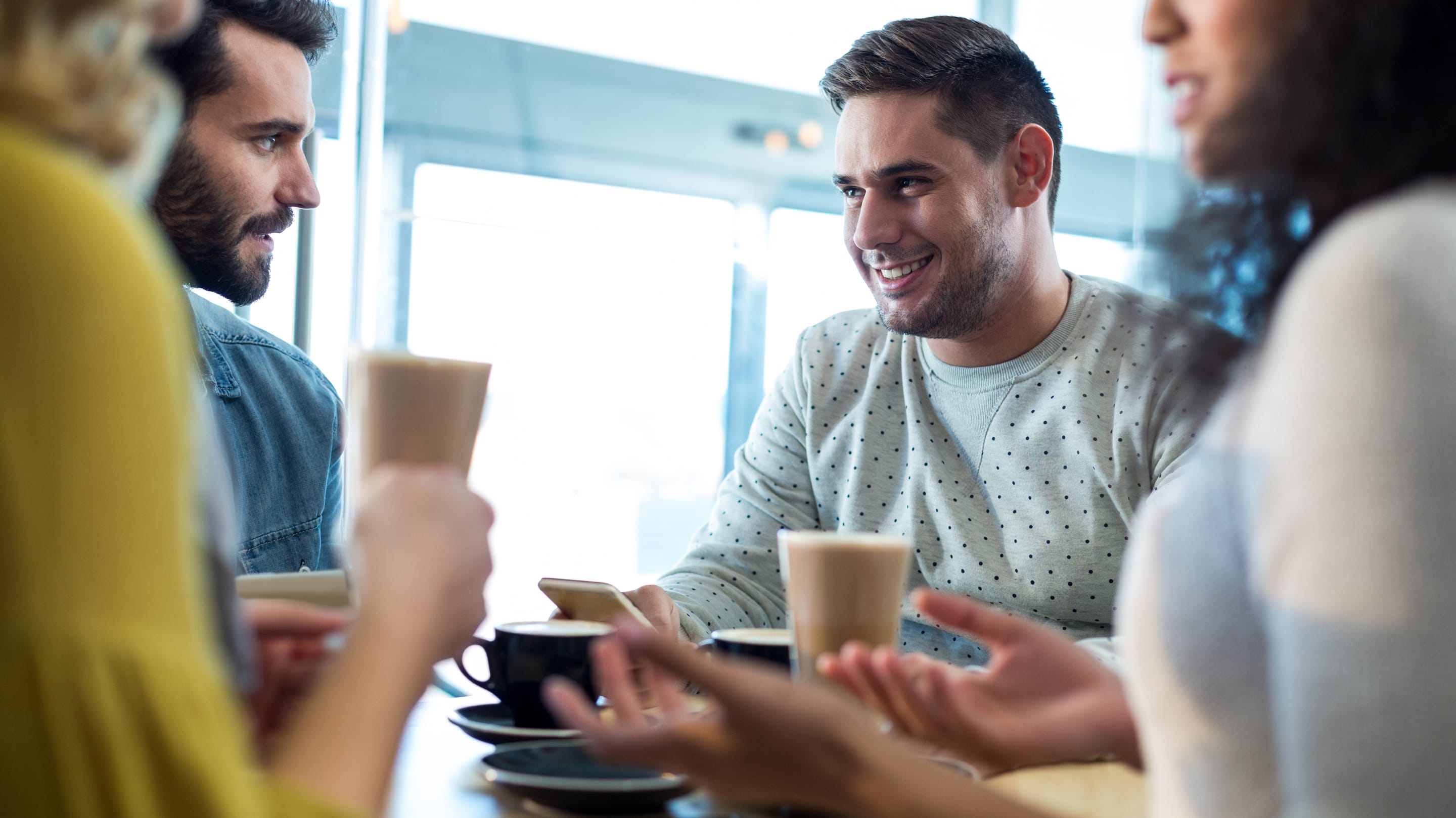A group conversation over coffee.
