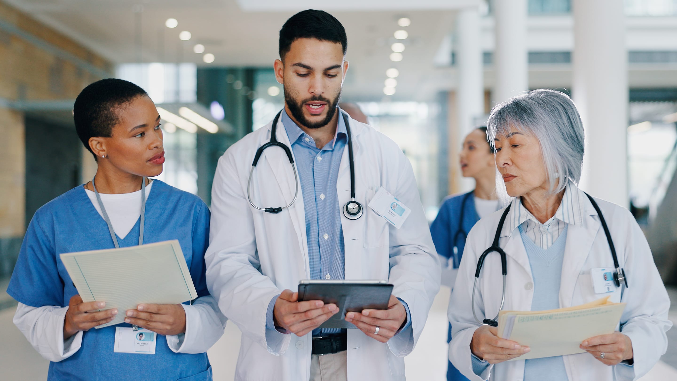 Image of a busy medical resident at work.