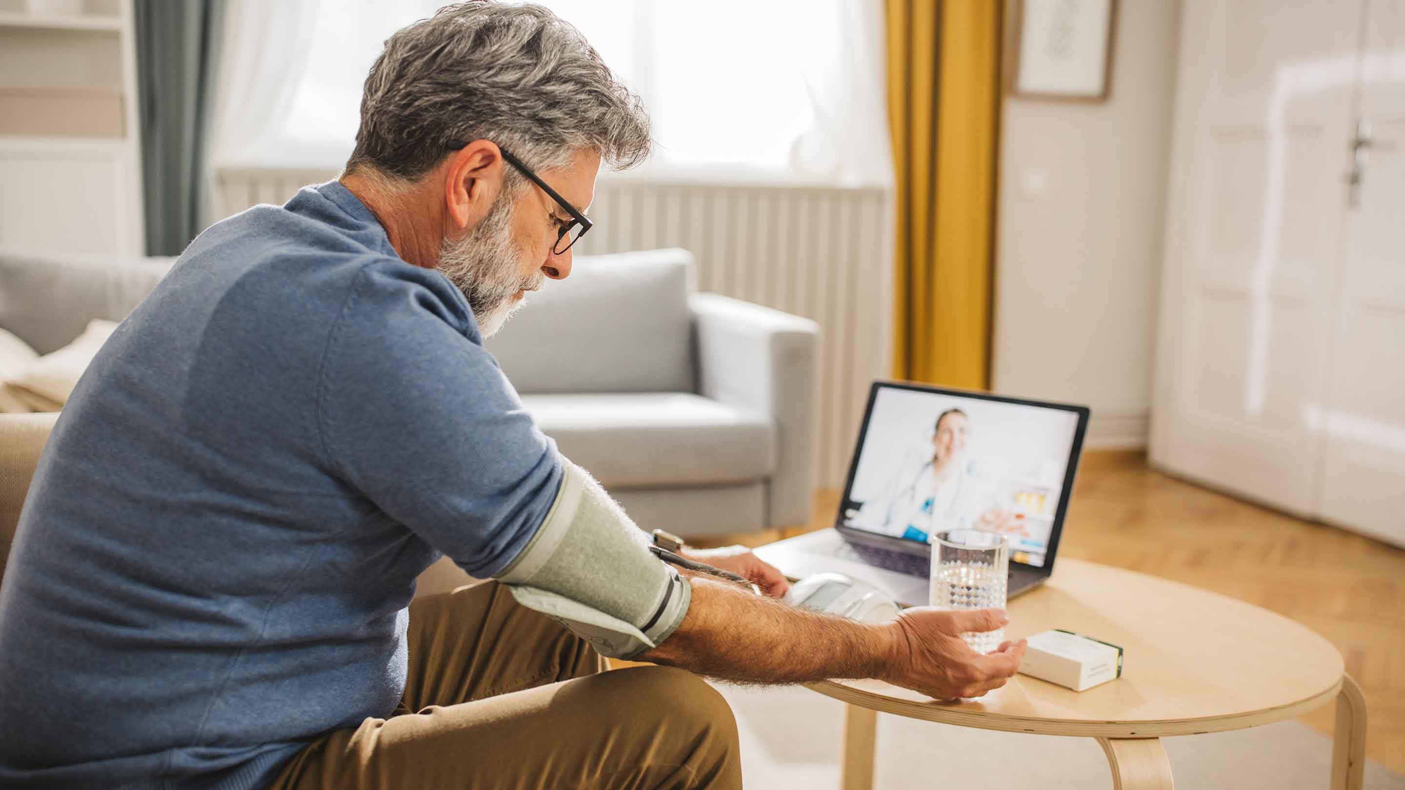 Man on telehealth with his doctor.