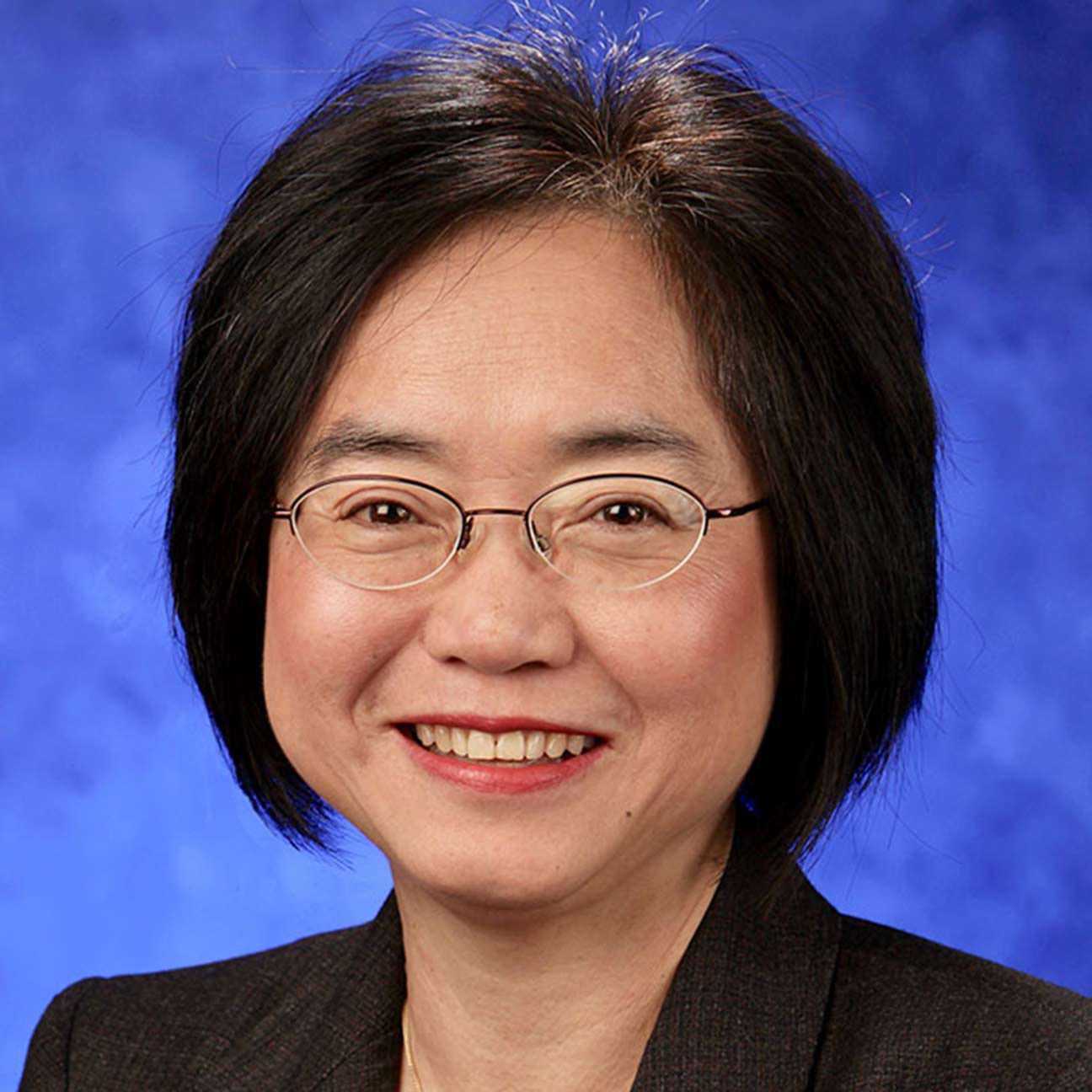 Thomas W. Johnson Award winner Shou Ling Leong, MD, with her quote from the story