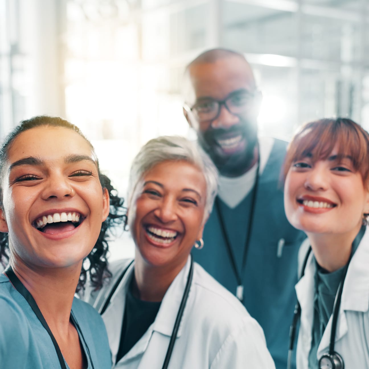 Image of a group of doctors smiling.