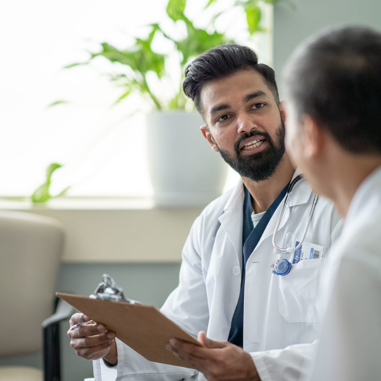 Image of physician talking to patient.