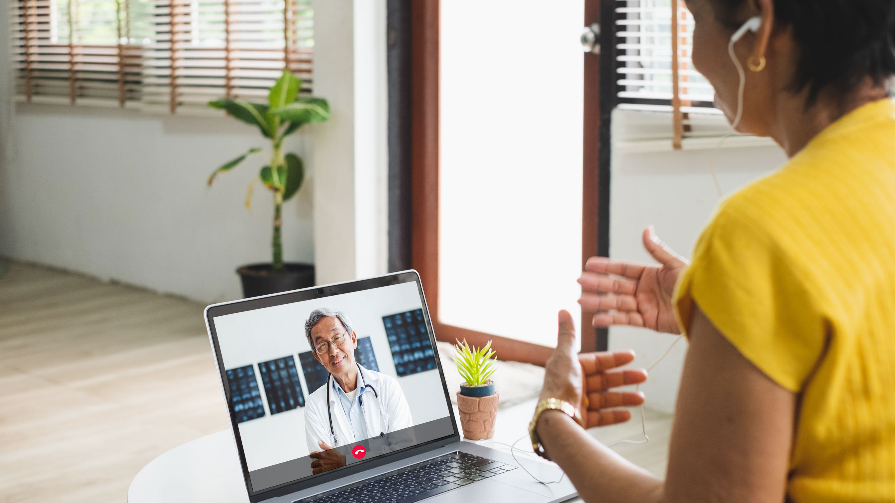 Telehealth video call between a doctor and patient.