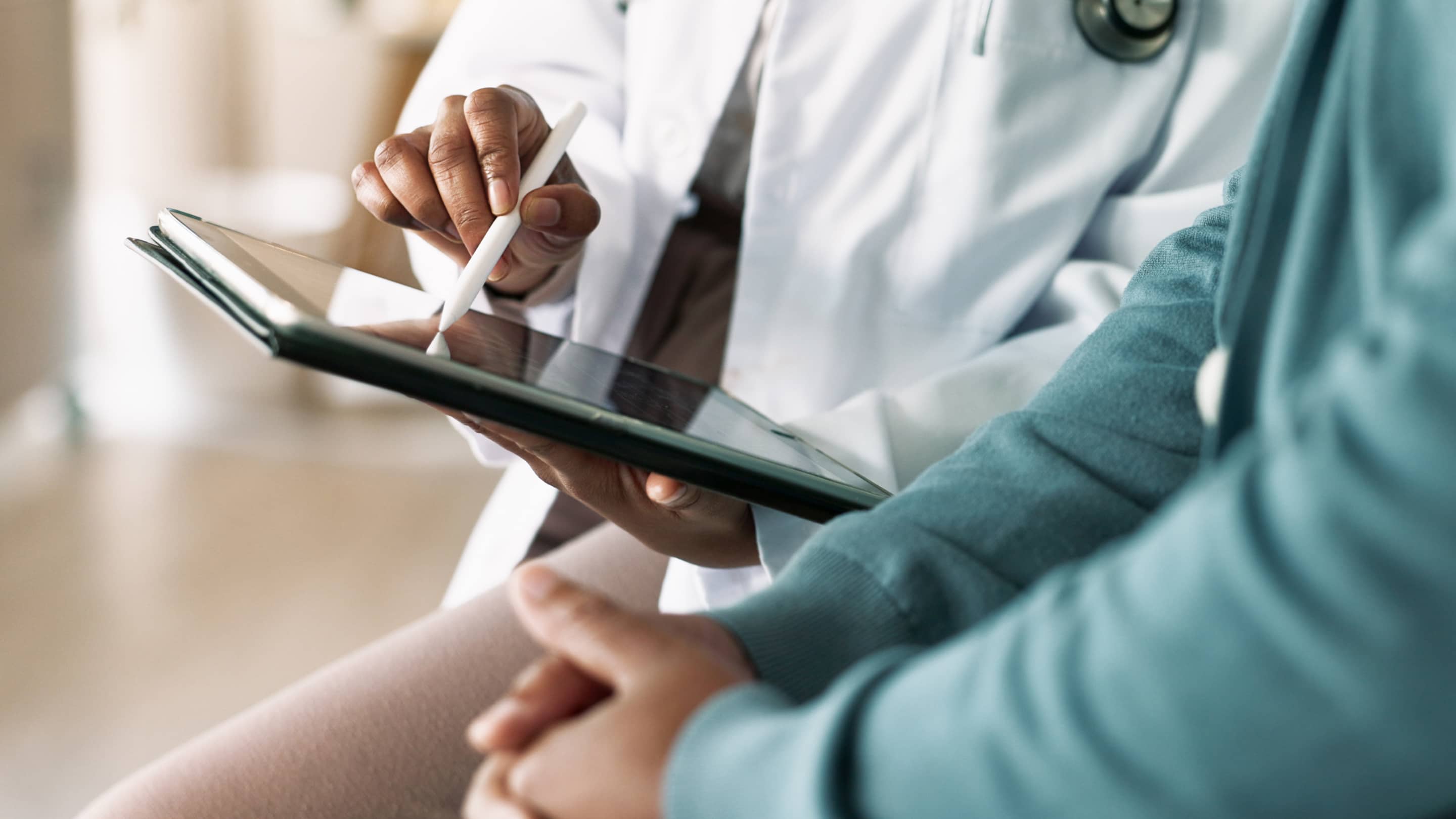 Close up of a patient having consultation with a doctor in hospital.