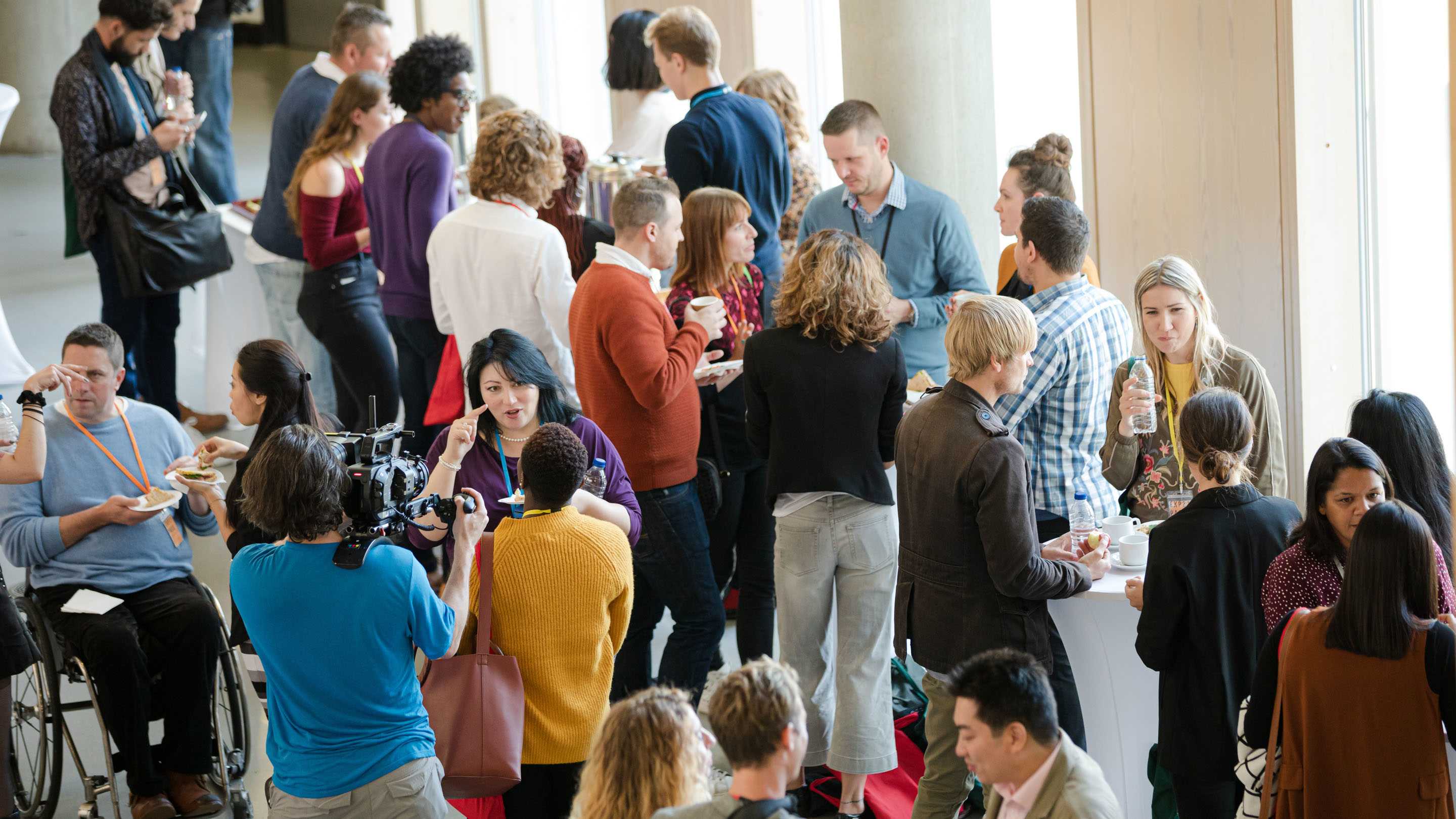 Family physician meets with community members at a local event