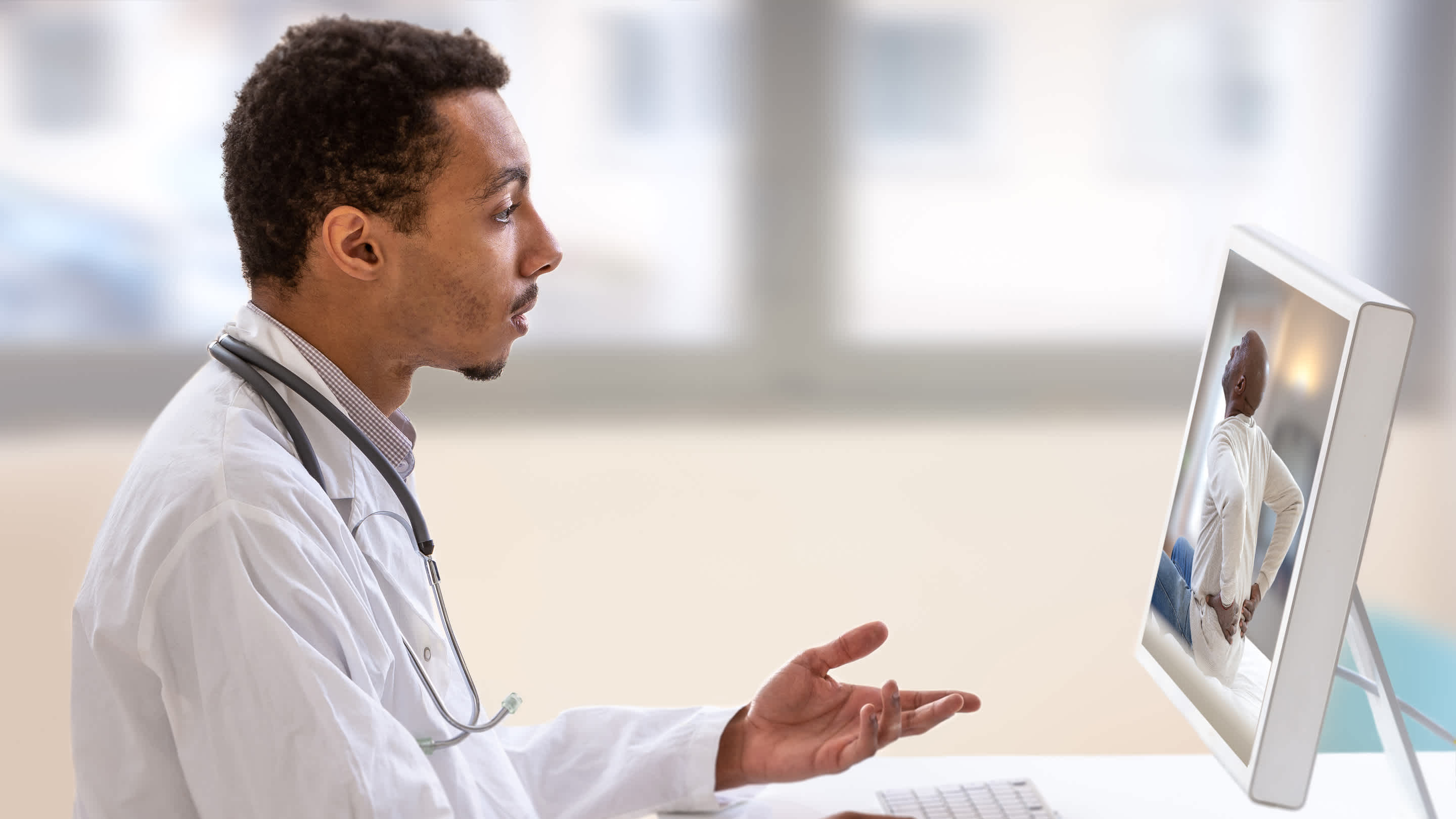Family physician provides virtual care during a telehealth visit.