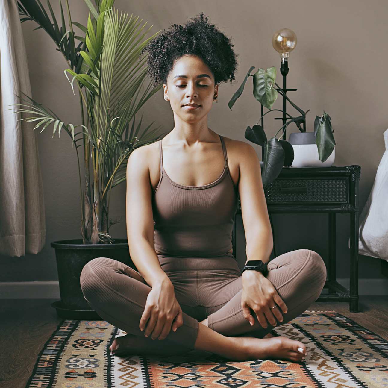 woman doing yoga and meditating