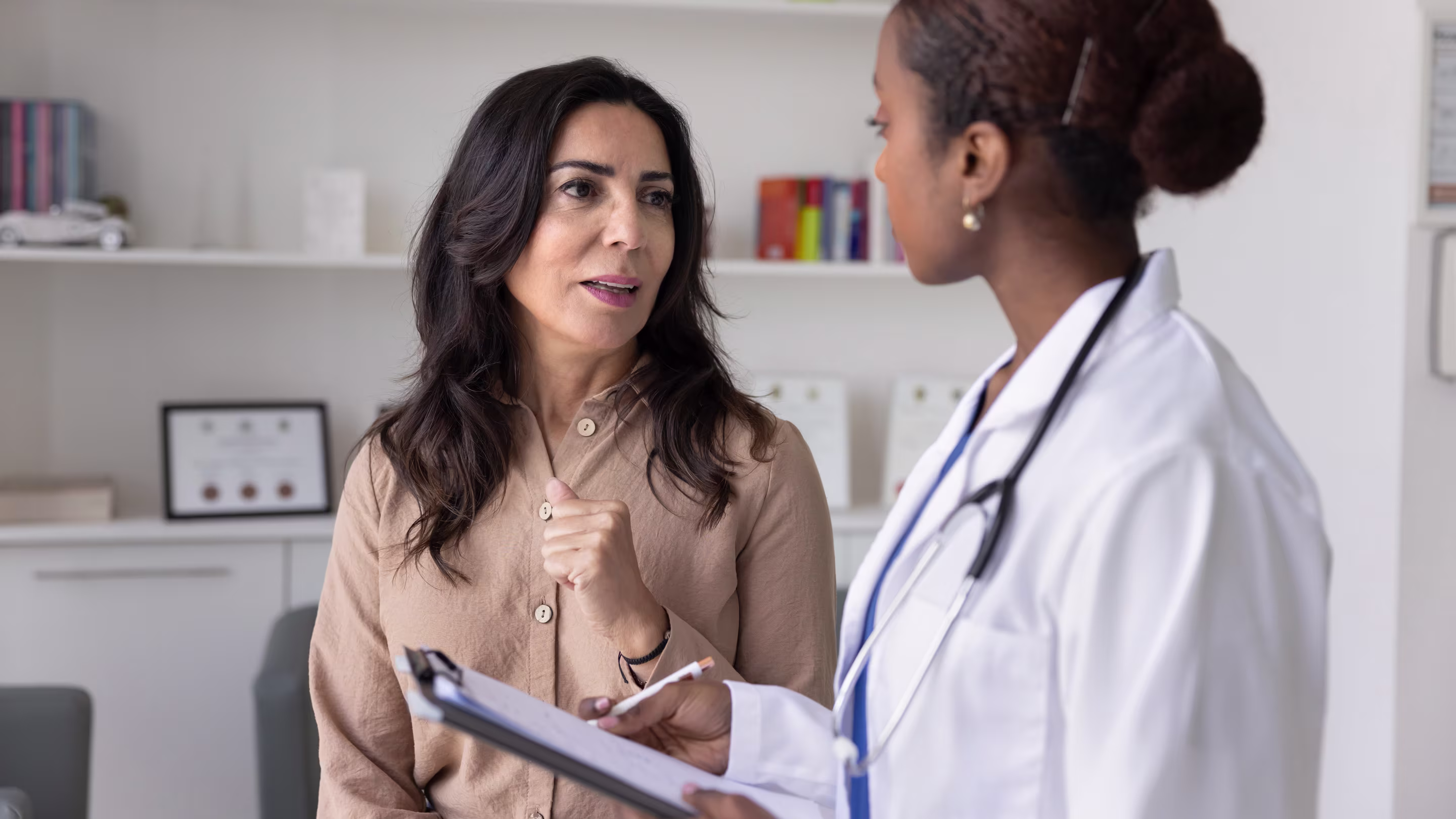 Older ADHD patient in conversation with a physician.