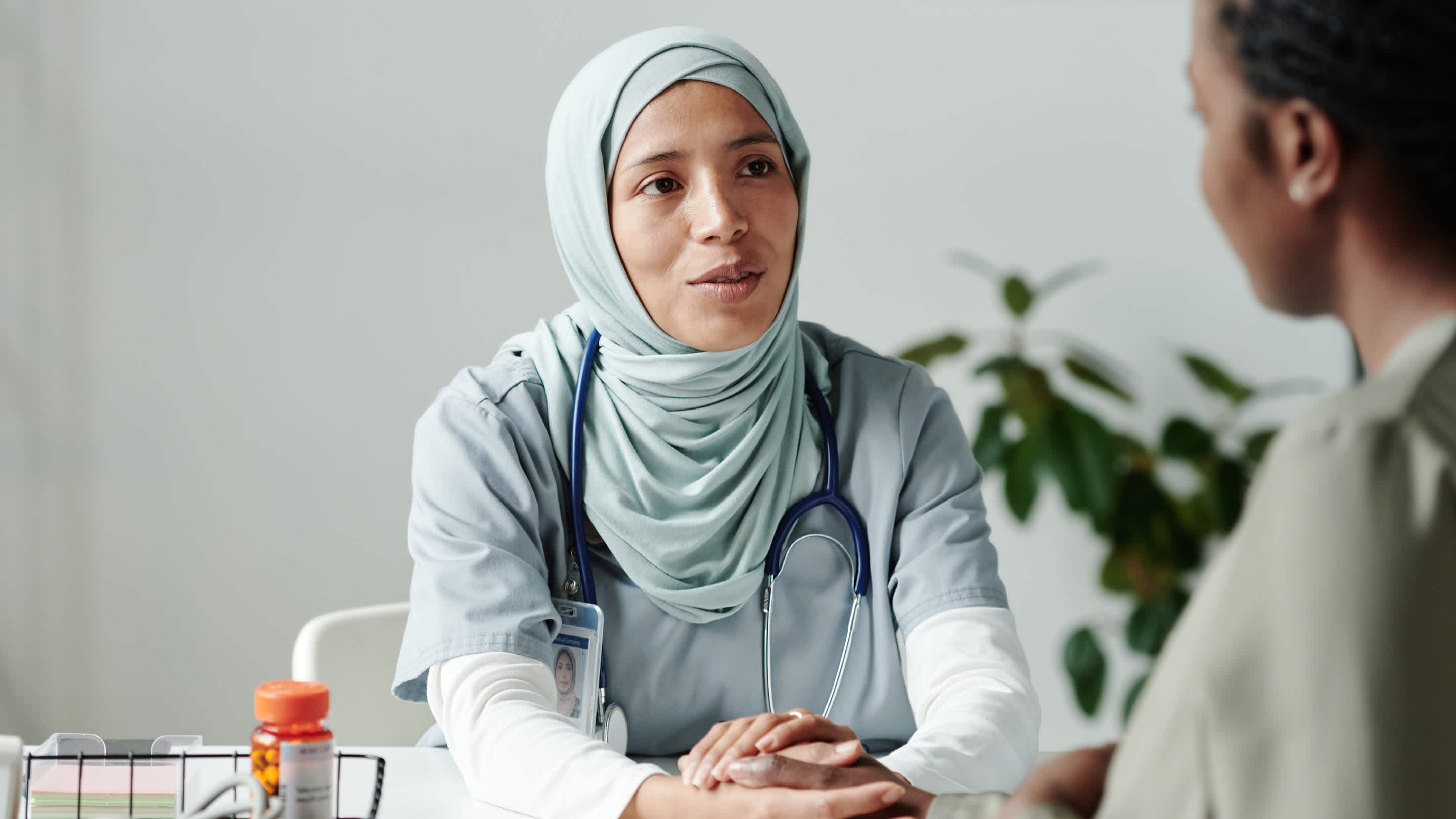 Family physician caring for a patient.