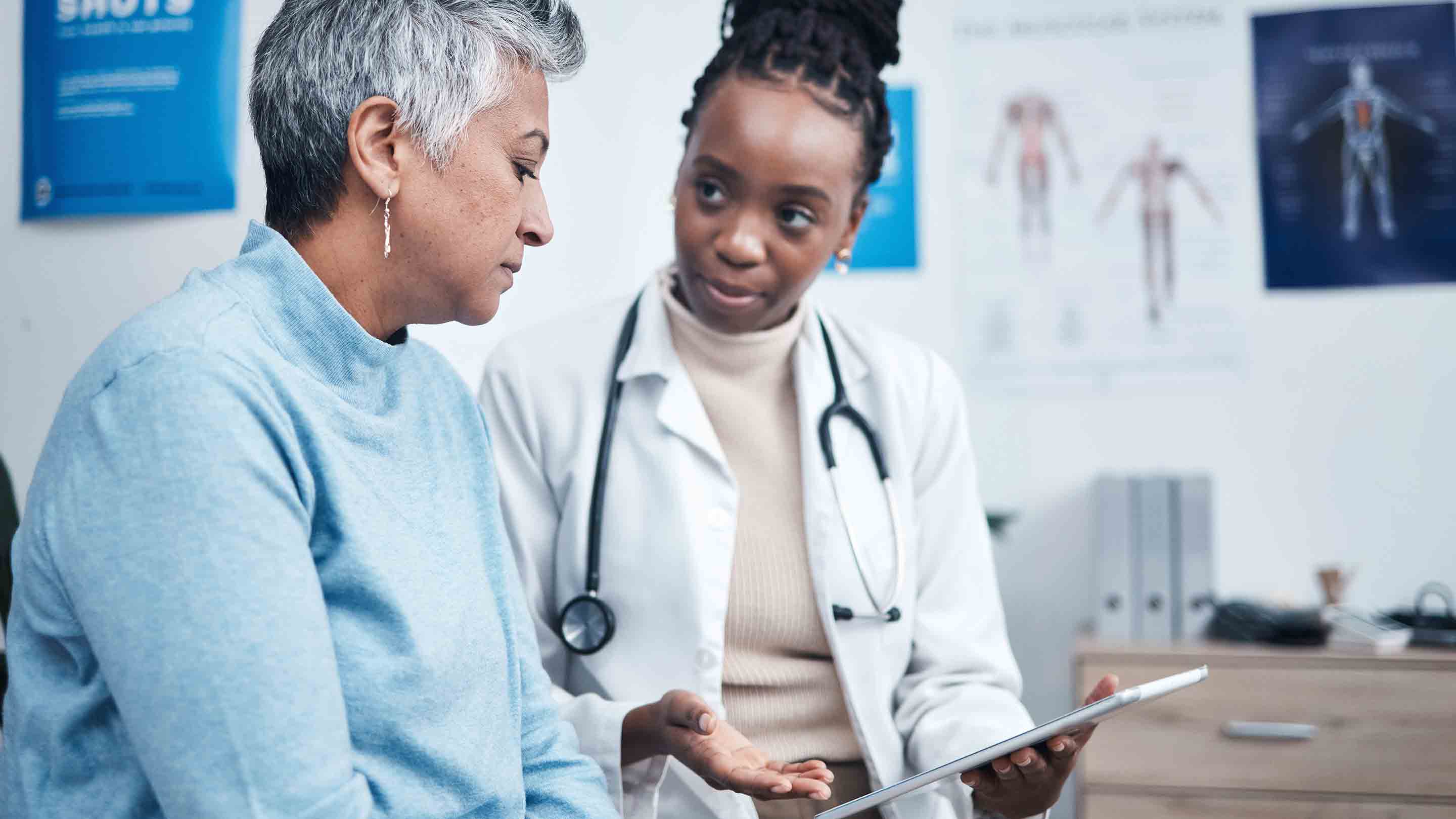 Doctor consulting with patient.