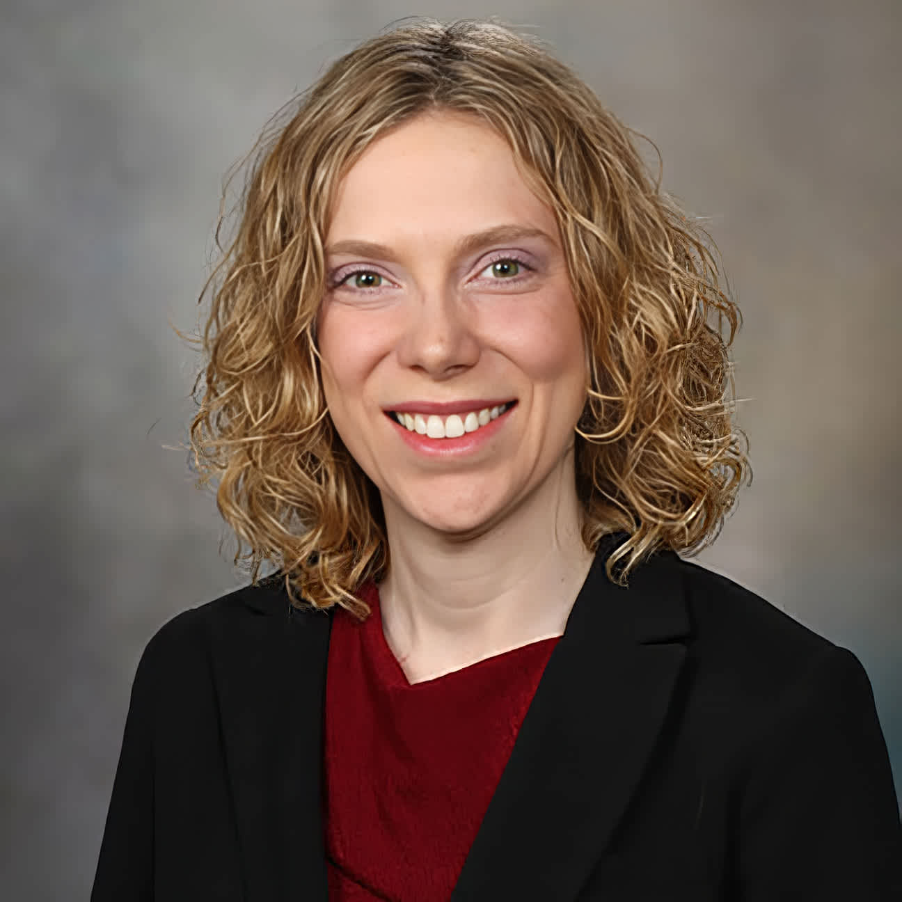 A portrait of Sara Oberhelman-Eaton.