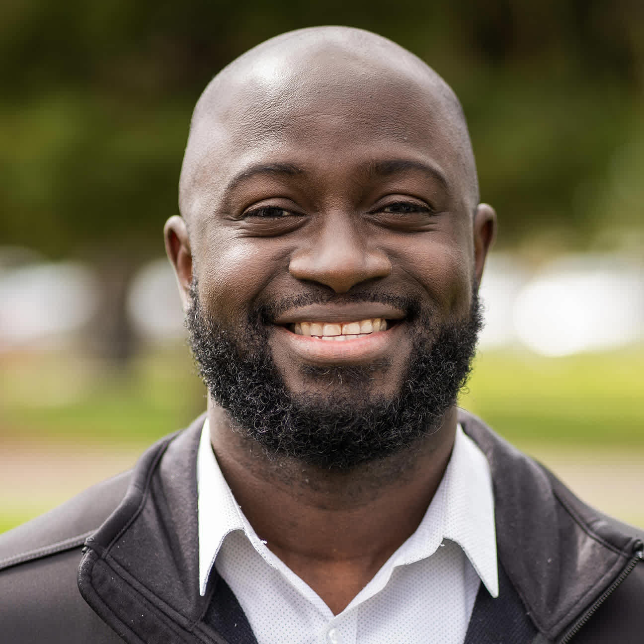 Robert Assibey's headshot.