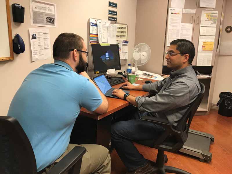 Asim Jaffer, M.D., (right) precepts residents like third-year resident Nathan Gallagher, M.D., at the UnityPoint Clinic-Family Medicine in Peoria, Ill.