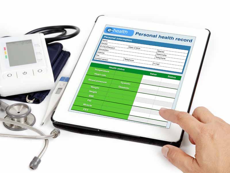 Patient personal health information shown on tablet.