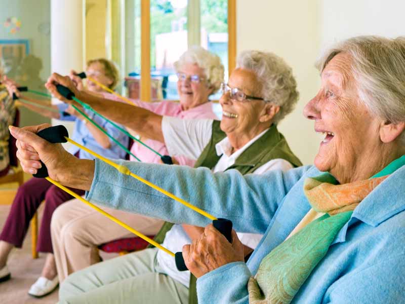 Group of older women exercising