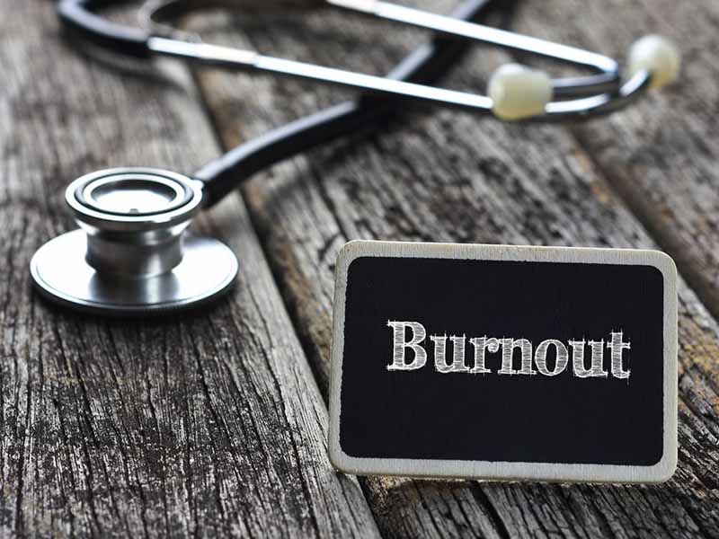 burnout sign and stethoscope
