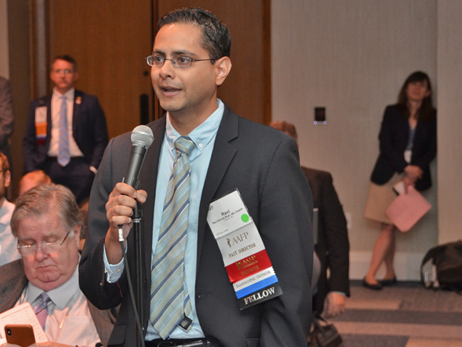 Ravi Grivois-Shah, M.D., testifies during a reference committee hearing