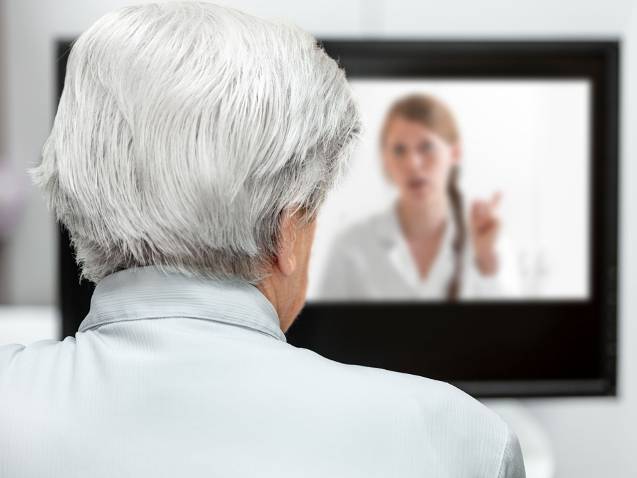 In-home care for an elderly patient with telemedicine or telehealth, virtual live chat on the monitor