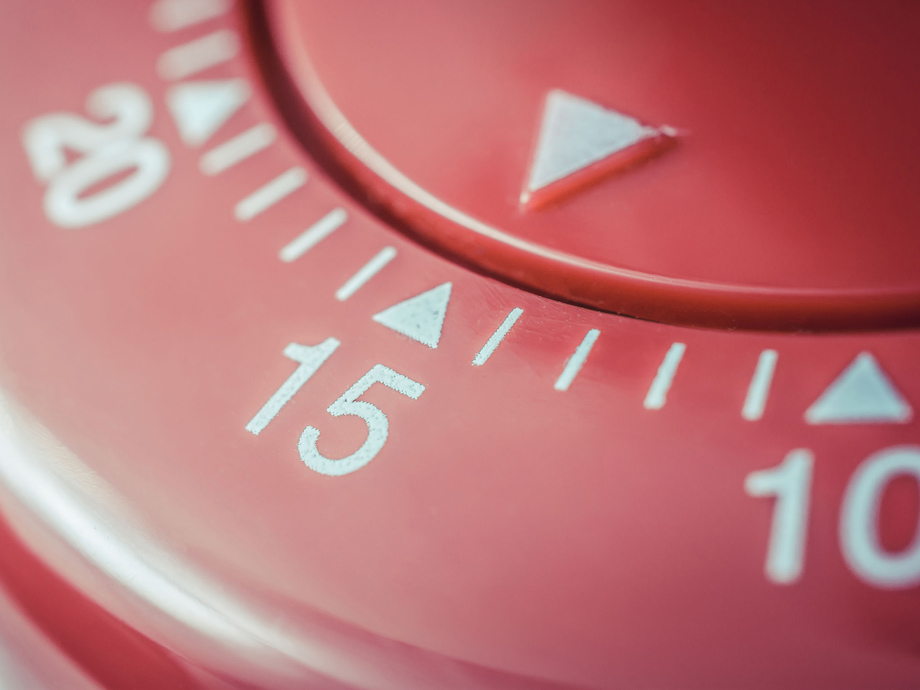 15 Minutes - A Macro Of A Flat Red Kitchen Egg Timer