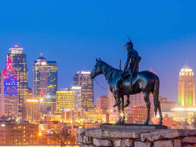 The Scout overlooking downtown Kansas City. The Scout is a famous statue(108 years old statue). It was conceived by Dallin in 1910