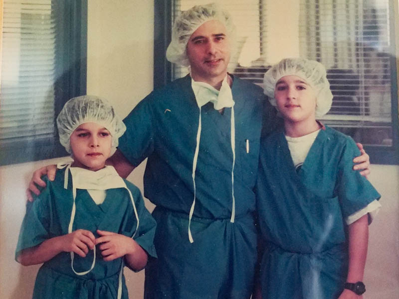 Luis Garcia, M.D., with brother and father