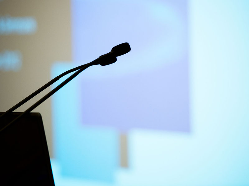 lectern and microphones in conference room