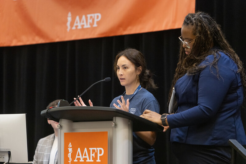 Attendees at podium during Congresses