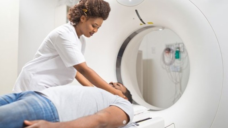 female care provider talking with male patient