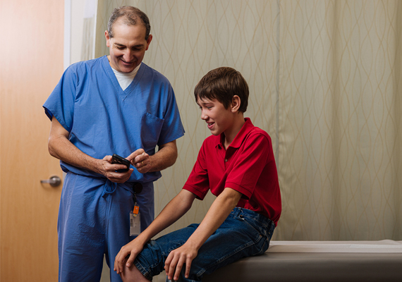 physician with young patient