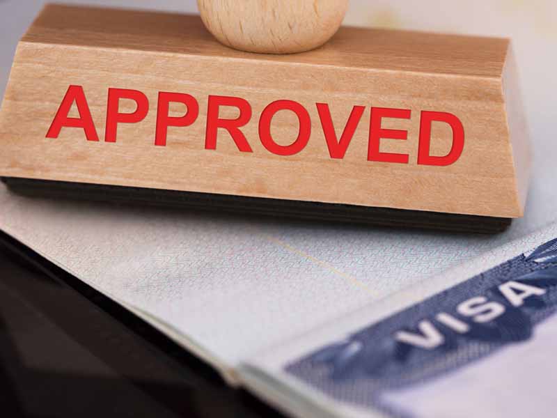 approved stamp over visa