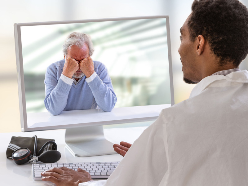 telehealth session between physician and older patient