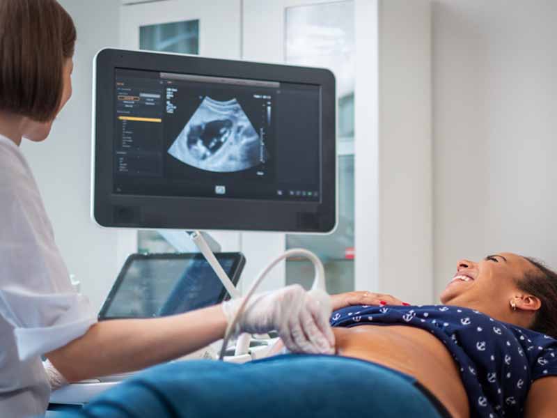 Doctor with ultrasound patient