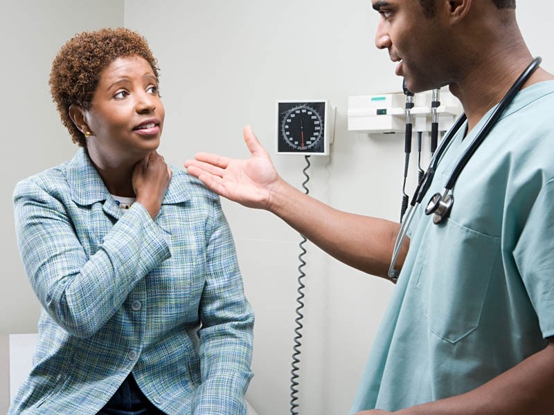physician having a conversation with female patient