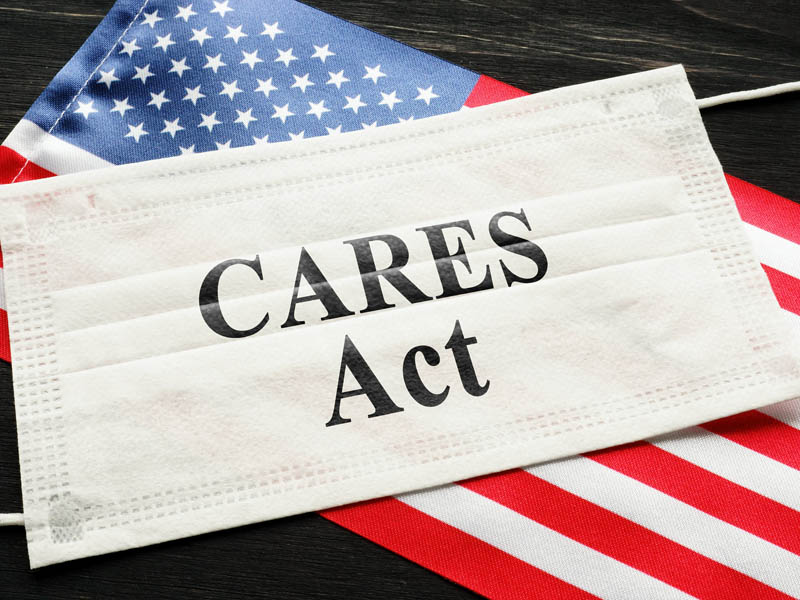 CARES Act on Mask and American Flag