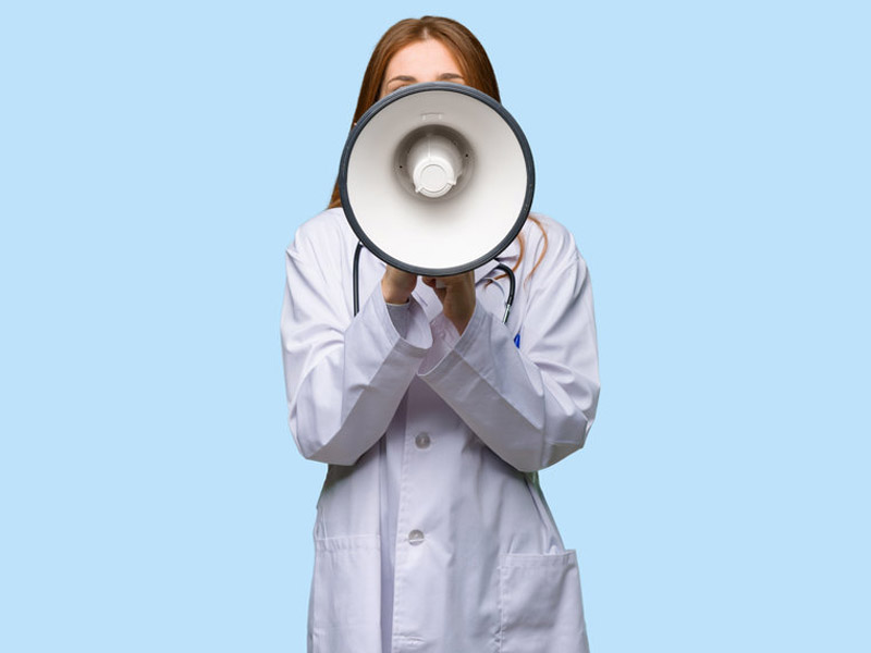 physician shouting into megaphone