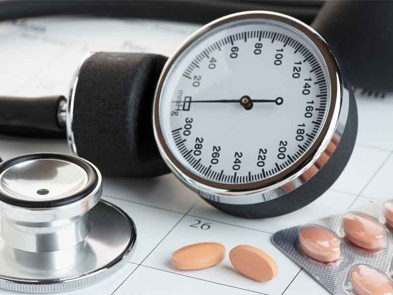 medicine and blood pressure monitor